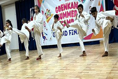 Students enjoying summer camp activities on campus