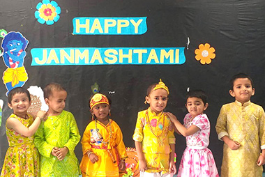 Janmashtami celebration with students in traditional attire